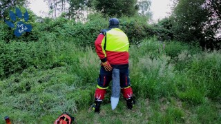 Forest Worker Pup pawing off in gear and boots (outdoors)