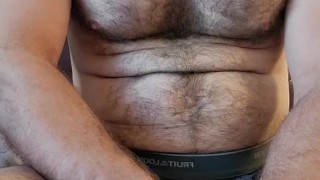 MUSCLE BEAR IN STRIPED BOXER BREIFS FLEXING ARMS AND CHEST!