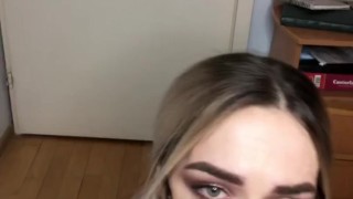 A blonde in a checkered skirt sucked a strap-on
