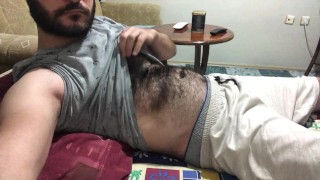 I'm getting ready to masturbate by stroking my hairy body