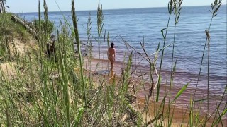 Sexy nudist girl on a wild beach
