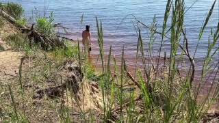 Sexy nudist girl on a wild beach