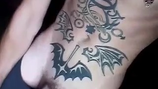 Horny inked twink smokes and flashes hard cock