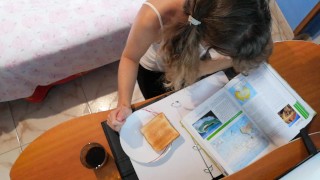 Cum breakfast-toast with milk while I am reading