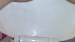 This slut loves to show me her big vagina while going to the bathroom
