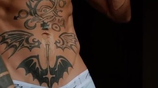 Tattooed big dick twink cools off