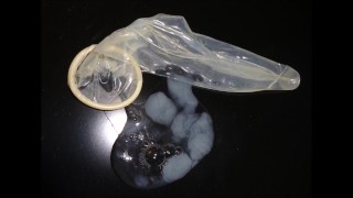 E-stim precum and cum collecting in a condom