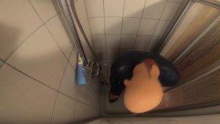 Put on zipperless neckentry latex catsuit under shower from Latex-Line