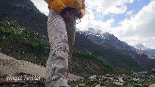 Traveler peeing in mountains - Angel Fowler 