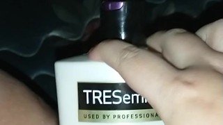 Bunni Stretching with thick conditioner bottle