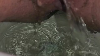 Chubby girl pissing