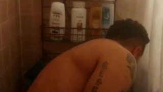 Thug jacks off until he cums on himself