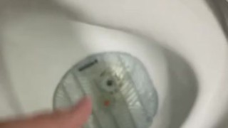 Having a risky wank in public toilets with cumshot
