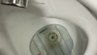 Having a risky wank in public toilets with cumshot