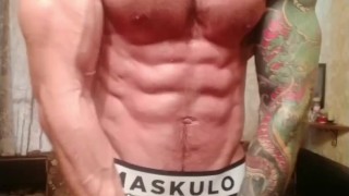 Muscle stud posing and jerking big dick