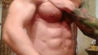 Muscle stud posing and jerking big dick
