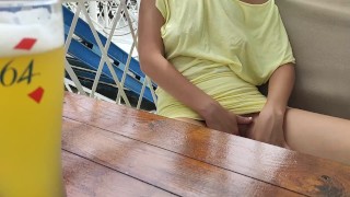 Alice bares her boobs in a cafe on the street and a little fingering under the table