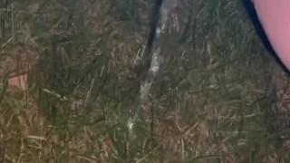 Redhead Pissing by the campfire 