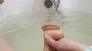 Kitty plays in the bathroom with a huge toy Loly_Kitty