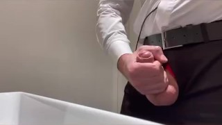 Toilet handjob and cum