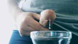 Thick cumshot into bowl