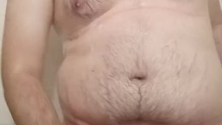 Jerking off and ass spanking in the shower