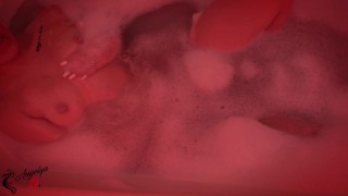 a girl with an excellent figure has fun in the bathroom with a dildo