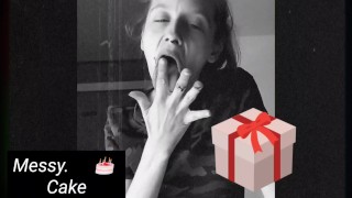 Messy eating birthday cake