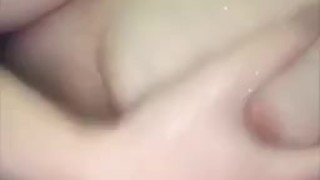 Plays with tits in shower