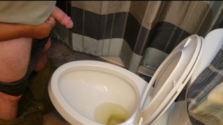I love holding his cock while he pees! Made a bit of a mess...