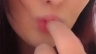 Teasing you, by sucking my finger 
