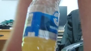 Pissing in the empty bottle like a champ