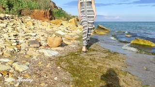 Alice lifts her skirt and shows her pussy and tits on the beach