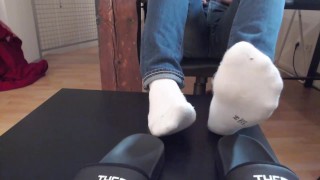 White socks, sandals and jeans