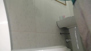 Girl peeing. Big butt and cute little pussy