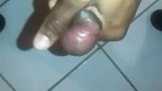 Masturbating