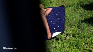 My neighbors' daughter is tanning naked in the garden