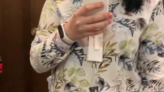 Pregnant beauty masturbates in a clothing store and tries on dresses