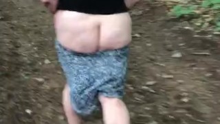 Big booty milf bare butt walking in the woods