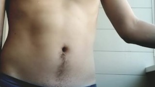 18 year old boy stands smoking in panties in college