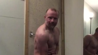 Muscle guy getting turned on pumping biceps with huge hard cock!