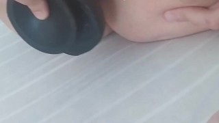 Masturbándose anal