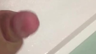 Horny Scott jerks off in the hotel shower!