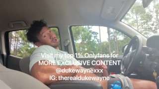 Cumming in a parking lot