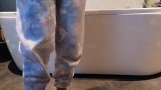 girl peeing all over the floor 