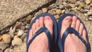 Feet in flip flops 