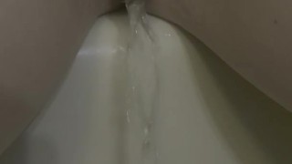 Slow pee in the shower