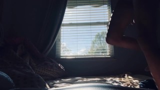 Quietly getting off in front of window while parents are home