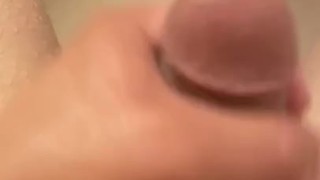 Jerking small pierced cock