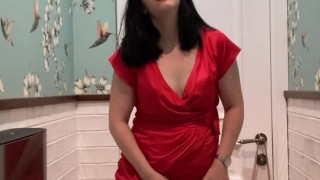 Hot brunette in red dress masturbates in a public restaurant